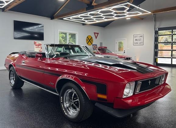 1973 Ford Mustang Convertible — red with black racing stripes